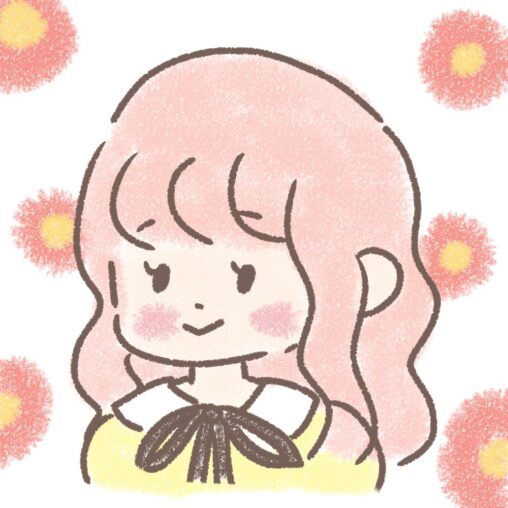 リボンのついた黄色のブラウスを着たピンクの髪のゆるふわヘアの女の子（花柄背景）